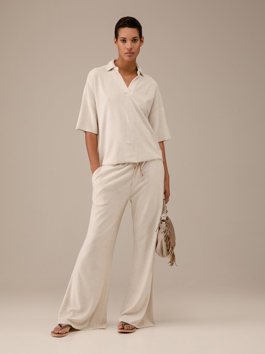 Detailansicht von Kurzarm-Poloshirt in Frotteeoptik von LOVE JOY VICTORY