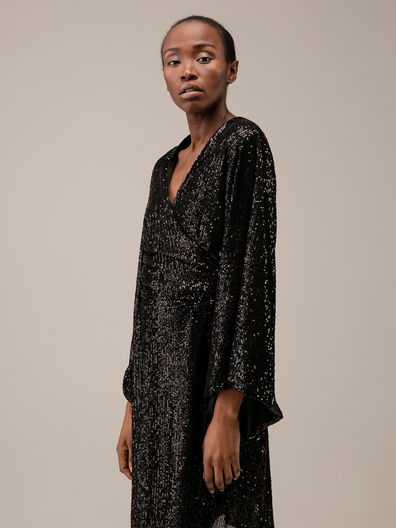 Detailansicht von Kurze Paillettenbluse von JADICTED